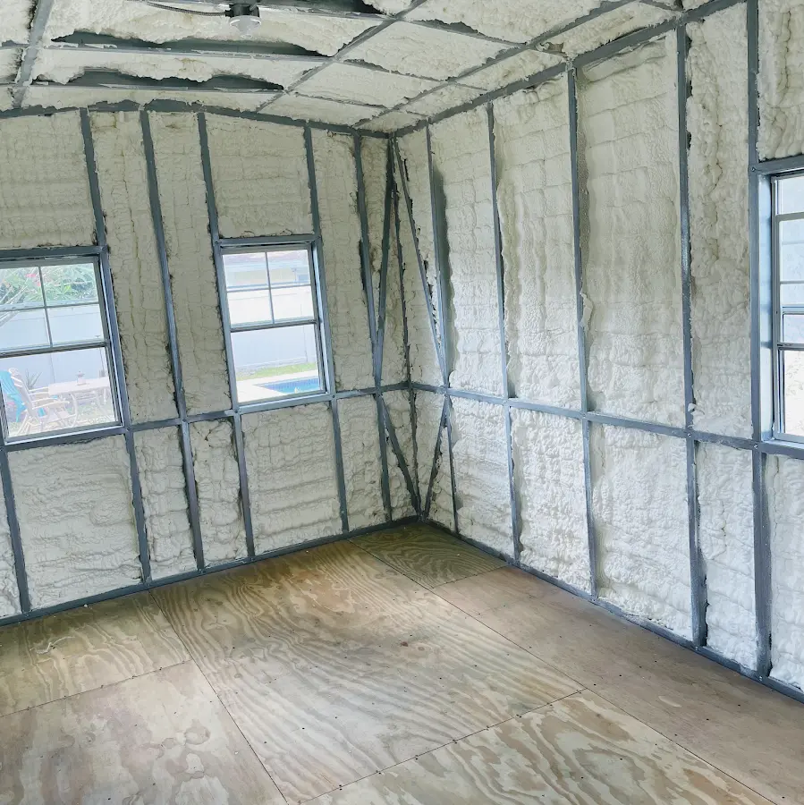 Closed-cell spray foam insulation applied to wall cavities in a residential project in Columbia